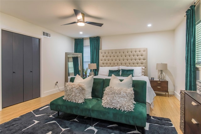 729 Bizerte Ave, Dallas, TX 75224 - bedroom with wood finished floors, ceiling fan, baseboards, recessed lighting, and a closet