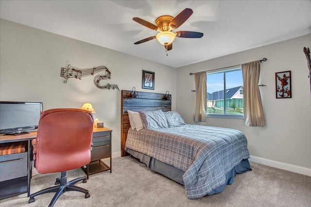 2400 Silver Maple Dr, Saint Paul, TX 75098 - carpeted bedroom with baseboards, a desk, and a ceiling fan