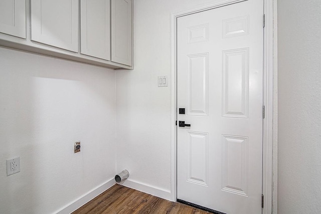 715 Pheasant Run, Burleson, TX 76028 - washroom with baseboards, cabinet space, electric dryer hookup, and dark wood-type flooring