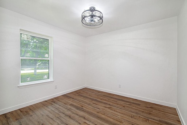 715 Pheasant Run, Burleson, TX 76028 - spare room with wood finished floors and baseboards