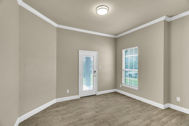 449 Hillstone Dr, Midlothian, TX 76065 - empty room featuring ornamental molding, light wood-style floors, and baseboards