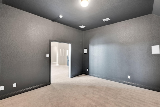 449 Hillstone Dr, Midlothian, TX 76065 - carpeted empty room featuring a textured wall and baseboards