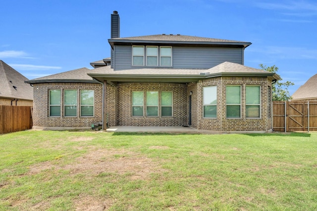 449 Hillstone Dr, Midlothian, TX 76065 - rear view of property featuring a chimney, a patio, brick siding, and roof with shingles