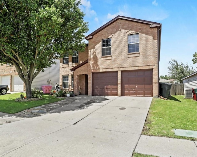 4325 Falcon Dr, Sherman, TX 75092 - traditional home featuring brick siding, concrete driveway, a garage, and a front lawn