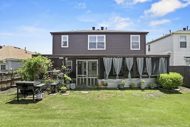 4325 Falcon Dr, Sherman, TX 75092 - rear view of house with a sunroom