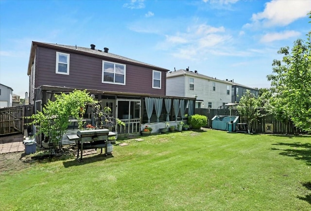 4325 Falcon Dr, Sherman, TX 75092 - back of house featuring a sunroom