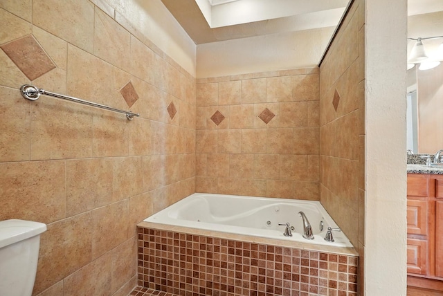 1125 Sayles Blvd, Abilene, TX 79605 - full bath with a jetted tub, toilet, and vanity