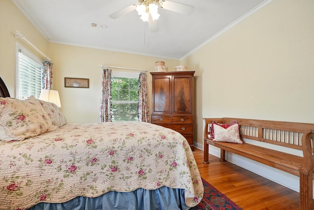 1125 Sayles Blvd, Abilene, TX 79605 - bedroom featuring wood finished floors, ornamental molding, a ceiling fan, vaulted ceiling, and baseboards