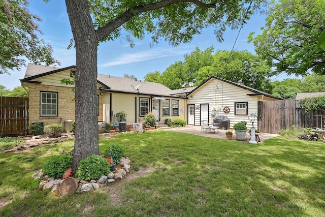 1125 Sayles Blvd, Abilene, TX 79605 - rear view of house featuring a patio area and stone siding