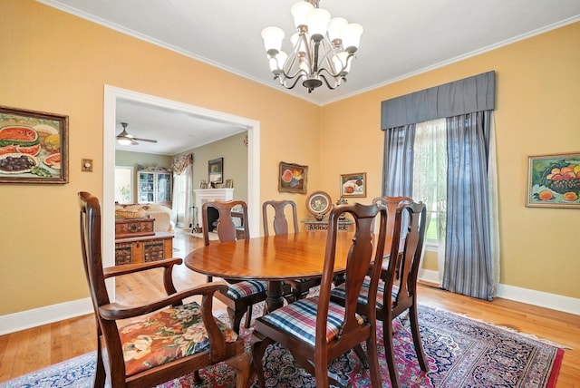 1125 Sayles Blvd, Abilene, TX 79605 - dining area featuring baseboards, light wood-style floors, a chandelier, ornamental molding, and ceiling fan