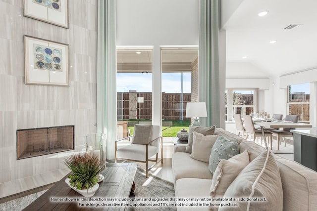 4031 Zina Ln, Prosper, TX 75078 - living room with wood finished floors, recessed lighting, and vaulted ceiling