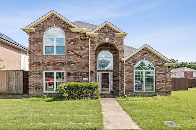 412 Kyle Ln, Lewisville, TX 75067 - traditional-style house featuring brick siding and roof with shingles