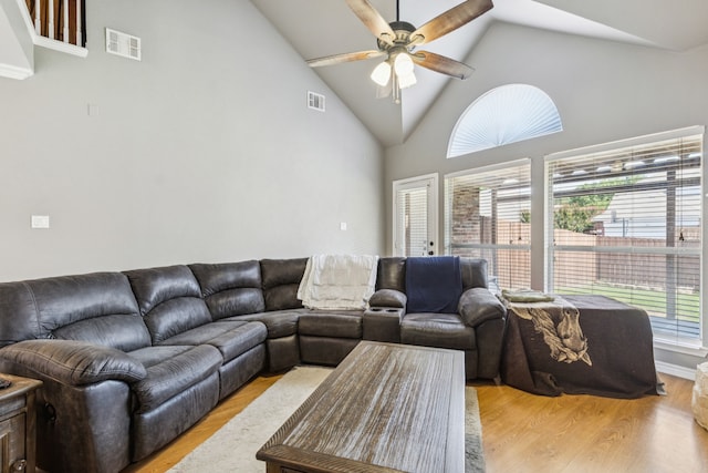 412 Kyle Ln, Lewisville, TX 75067 - living area featuring light wood-style flooring, a ceiling fan, and high vaulted ceiling