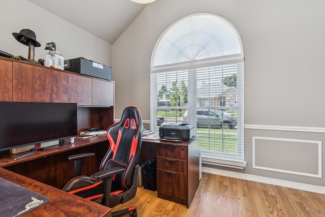 412 Kyle Ln, Lewisville, TX 75067 - office featuring light wood-style flooring, lofted ceiling, and plenty of natural light