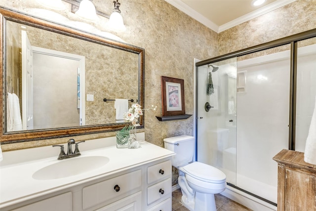 12744 Concho Dr, Frisco, TX 75033 - bathroom with crown molding, a shower stall, vanity, toilet, and tile patterned flooring
