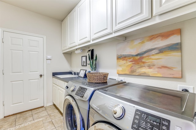 12744 Concho Dr, Frisco, TX 75033 - washroom featuring washer and dryer, cabinet space, and light tile patterned floors