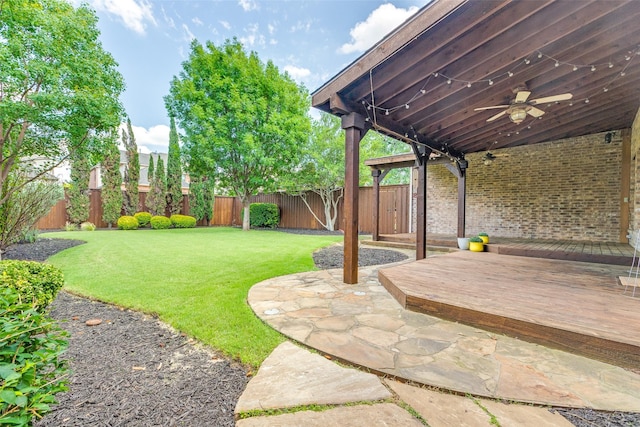 12744 Concho Dr, Frisco, TX 75033 - view of yard featuring a ceiling fan, a patio, and a wooden deck