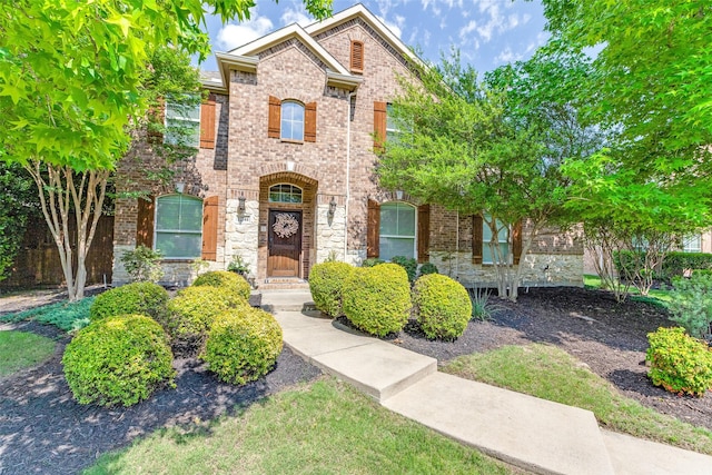 12744 Concho Dr, Frisco, TX 75033 - view of front of home with stone siding and brick siding