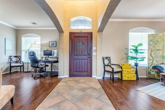 12744 Concho Dr, Frisco, TX 75033 - foyer featuring ornamental molding, baseboards, and healthy amount of natural light