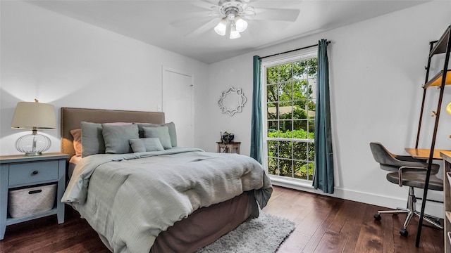 8534 Vista View Dr, Dallas, TX 75243 - bedroom with dark wood-style flooring, baseboards, and a ceiling fan