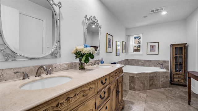 8534 Vista View Dr, Dallas, TX 75243 - bathroom featuring double vanity and a bath