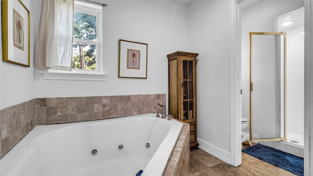 8534 Vista View Dr, Dallas, TX 75243 - bathroom featuring toilet, a shower stall, a whirlpool tub, and baseboards
