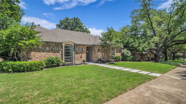 8534 Vista View Dr, Dallas, TX 75243 - view of front of property with brick siding, a front yard, and roof with shingles