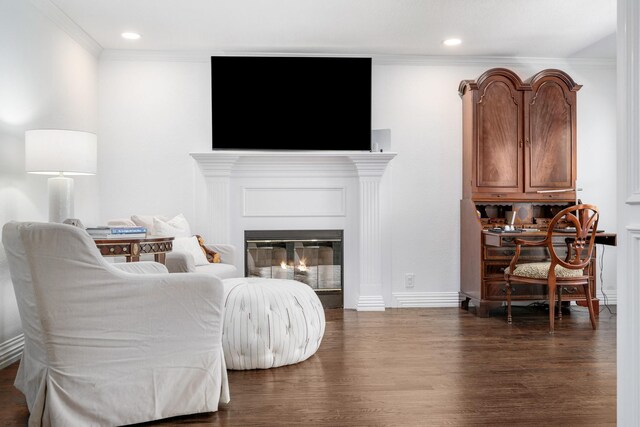4009 Tave Ct, Arlington, TX 76016 - living room with dark wood-type flooring, crown molding, a glass covered fireplace, recessed lighting, and baseboards