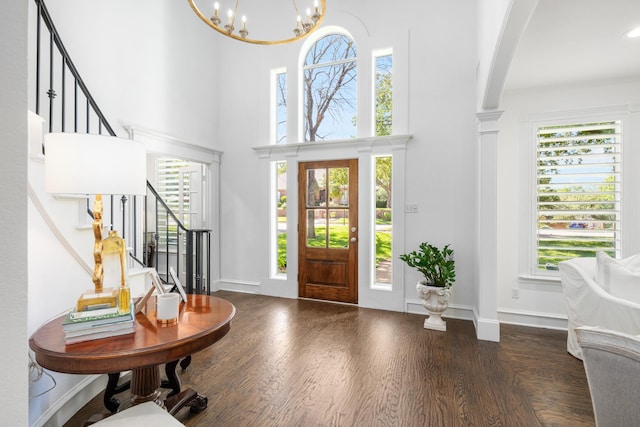 4009 Tave Ct, Arlington, TX 76016 - entrance foyer with stairs, a high ceiling, a chandelier, wood finished floors, and baseboards