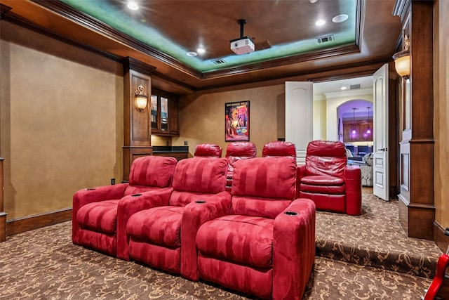 6203 Sweeney Trl, Frisco, TX 75034 - carpeted cinema room featuring ornamental molding, a tray ceiling, baseboards, and recessed lighting