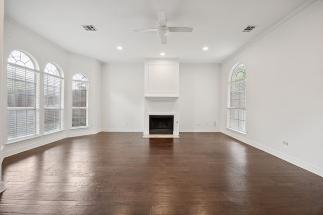5836 Oram St, Dallas, TX 75206 - unfurnished living room featuring ceiling fan, healthy amount of natural light, dark wood-type flooring, a fireplace with flush hearth, and recessed lighting