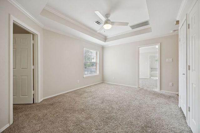 5836 Oram St, Dallas, TX 75206 - unfurnished bedroom featuring crown molding, carpet flooring, a raised ceiling, a ceiling fan, and baseboards