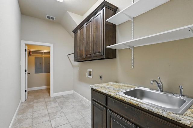 209 Ellis Creek Dr, Weatherford, TX 76085 - laundry area featuring hookup for a washing machine, hookup for an electric dryer, cabinet space, and baseboards