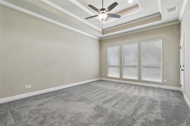 209 Ellis Creek Dr, Weatherford, TX 76085 - carpeted spare room featuring a tray ceiling, a ceiling fan, crown molding, and baseboards