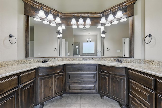 209 Ellis Creek Dr, Weatherford, TX 76085 - bathroom with double vanity and tile patterned floors