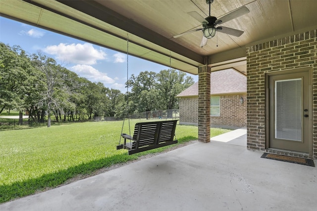 209 Ellis Creek Dr, Weatherford, TX 76085 - view of patio / terrace featuring a ceiling fan and view of wooded area