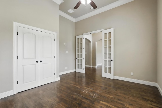 209 Ellis Creek Dr, Weatherford, TX 76085 - unfurnished bedroom with french doors, crown molding, wood finished floors, baseboards, and a closet