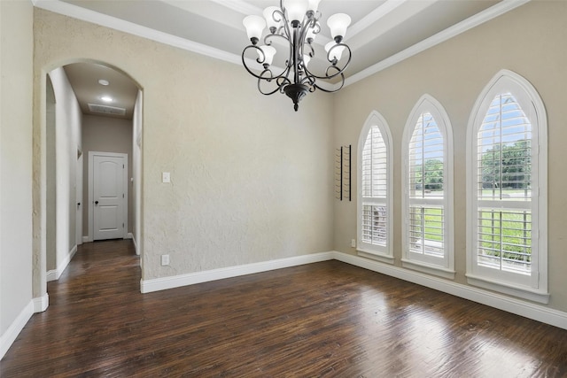 209 Ellis Creek Dr, Weatherford, TX 76085 - empty room with arched walkways, dark wood finished floors, ornamental molding, a chandelier, and baseboards