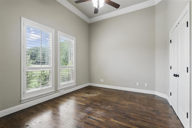 209 Ellis Creek Dr, Weatherford, TX 76085 - empty room featuring crown molding, a ceiling fan, dark wood finished floors, and baseboards