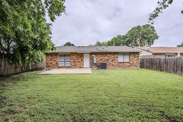 7108 Christie Ln, Dallas, TX 75249 - rear view of property featuring cooling unit, a patio, brick siding, and roof with shingles