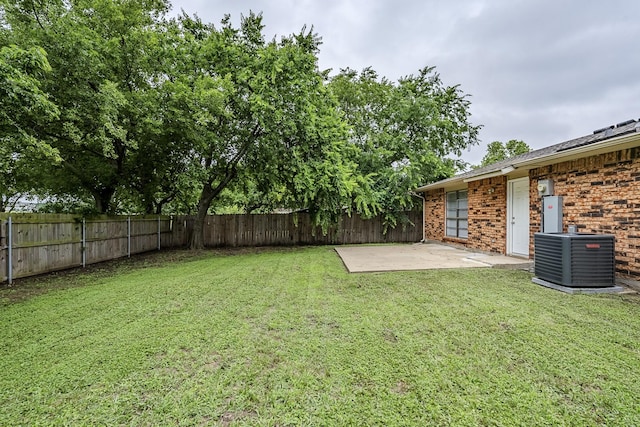 7108 Christie Ln, Dallas, TX 75249 - view of yard with central AC unit and a patio