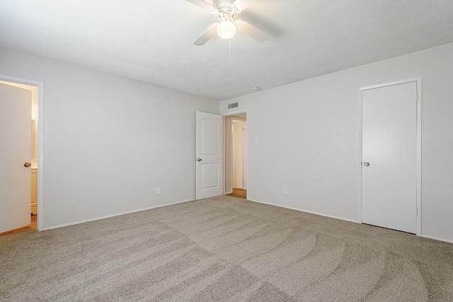 7108 Christie Ln, Dallas, TX 75249 - unfurnished bedroom featuring carpet flooring, baseboards, and a ceiling fan