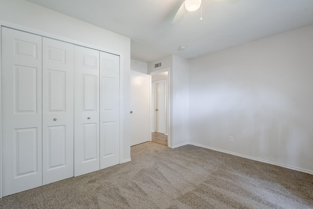 7108 Christie Ln, Dallas, TX 75249 - unfurnished bedroom featuring carpet flooring, a closet, ceiling fan, and baseboards