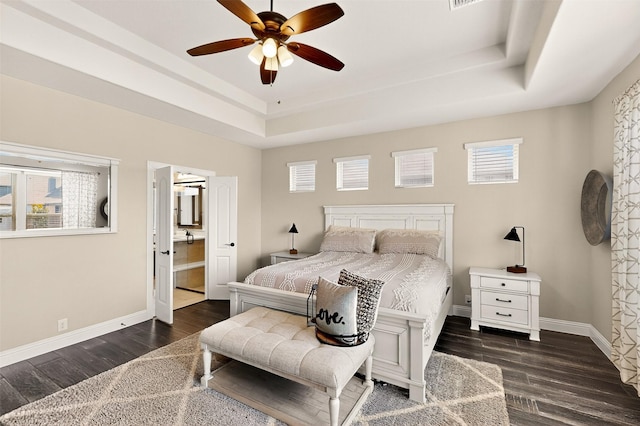 734 Oakleaf Dr, Midlothian, TX 76065 - bedroom with a raised ceiling, wood finished floors, multiple windows, and baseboards