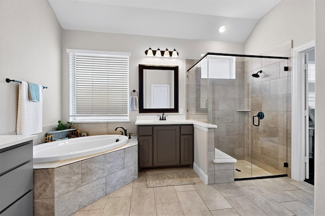 734 Oakleaf Dr, Midlothian, TX 76065 - full bath featuring vanity, a garden tub, a stall shower, lofted ceiling, and tile patterned flooring