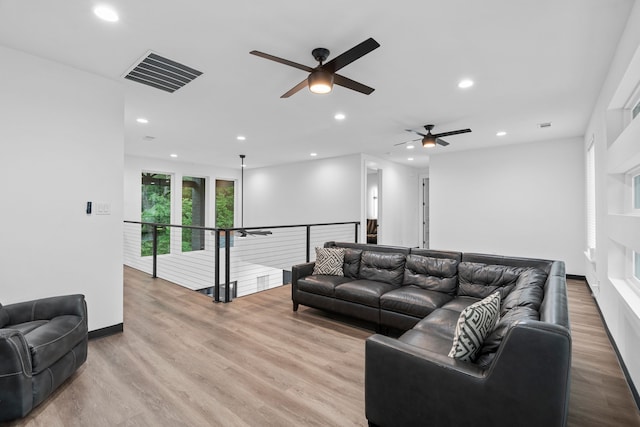 2303 Timber Creek Ct, Cedar Hill, TX 75104 - living area featuring a ceiling fan, light wood-style floors, recessed lighting, and baseboards