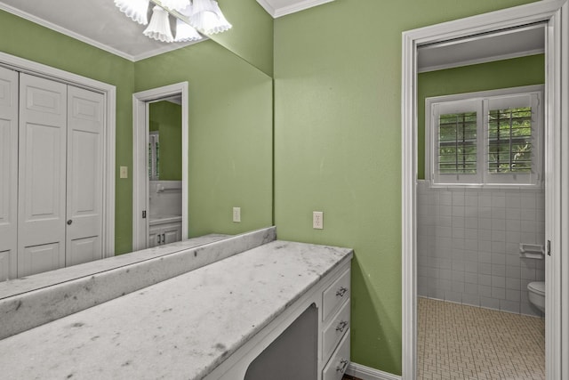 1108 Quitman St, Pittsburg, TX 75686 - bathroom featuring toilet, a chandelier, vanity, ornamental molding, and a closet