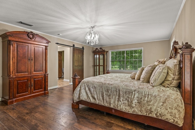 1108 Quitman St, Pittsburg, TX 75686 - bedroom featuring a barn door, dark wood-style floors, baseboards, a chandelier, and ornamental molding
