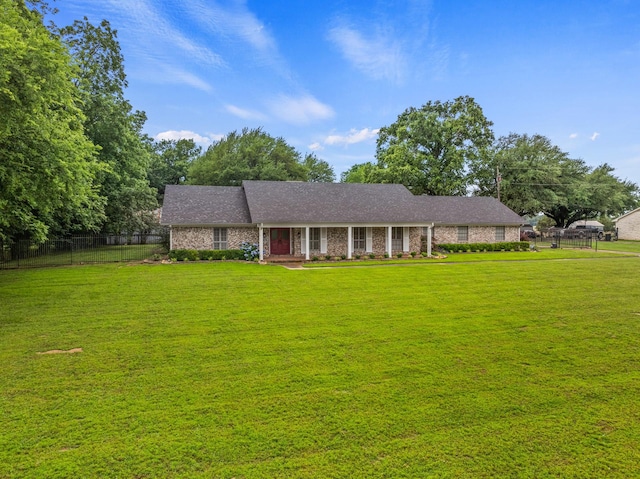 1108 Quitman St, Pittsburg, TX 75686 - ranch-style house featuring covered porch and brick siding