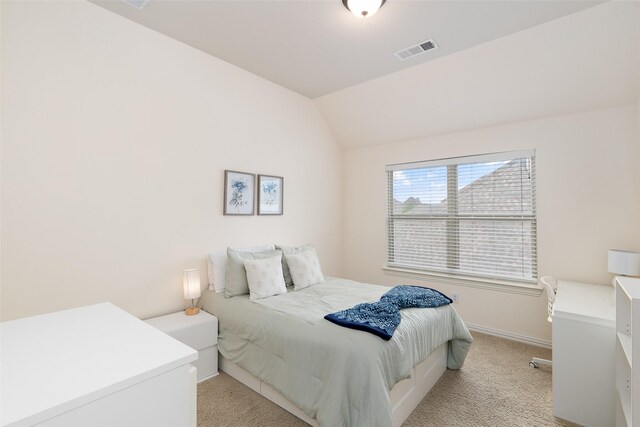 843 Bear Crossing Dr, Allen, TX 75013 - bedroom featuring light carpet, vaulted ceiling, and baseboards